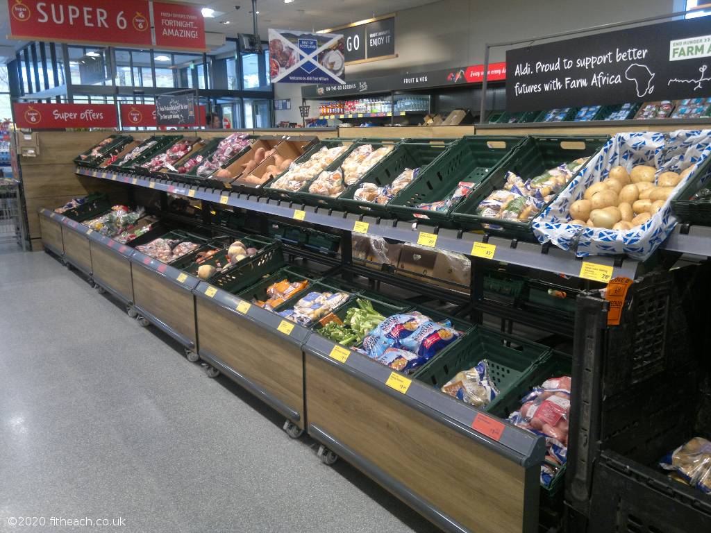 Photo of one side of the fruit and veg aisle at Aldi.